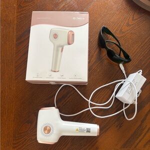 White and Rose Gold Hair Removal Device